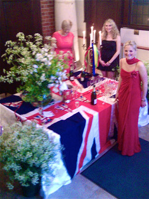 Effie Robins, co-organiser of the Olympic Jubilee Ball, looks resplendent in a red ball gown