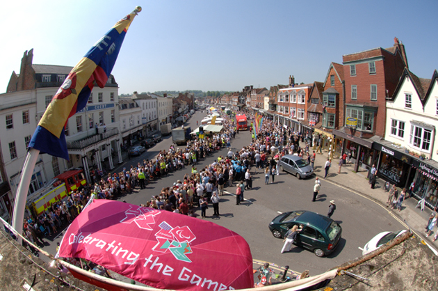 An estimated crowd of more than 5,000 lining Marlborough High Street awaiting the Torch entourage