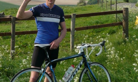 Tom Nicholls with the bike that he will ride to John O'Groats