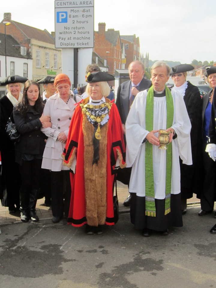 The Rector blesses the market