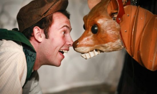 James Laurence Hunter as Dickon with Captain the fox in a scene from The Secret Garden