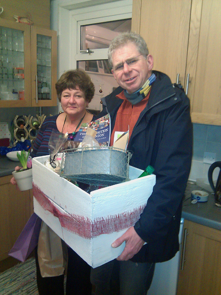 Cllr Richard Pitts presenting Sarah Hicks with the winning prize in the grand hamper raffle