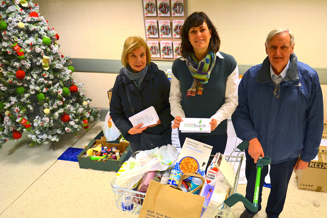 Hazel Jennings and Christopher Sloane of Devizes Food Bank with Claire Perry MP (centre)