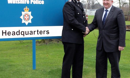 Wiltshire's new Chief Constable, Patrick Geenty, being congratulated by the county's recently appointed Police and Crime Commissioner, Angus Macpherson