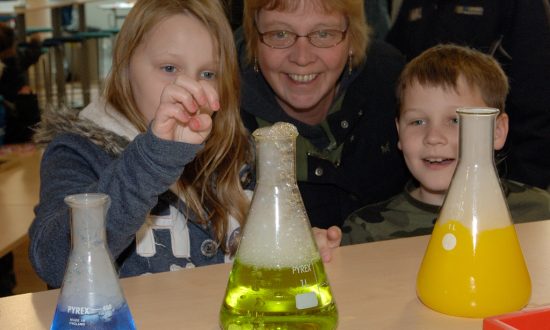 Mark, Emma and Mum marvel at the effect of Dry Ice at the St John's Academy Science Fair