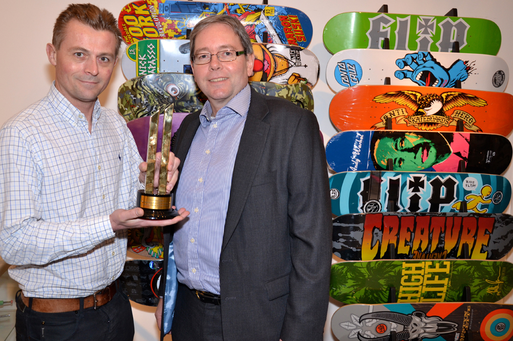 Charlie Allen of Shiner and Nigel Scott of ActionCOACH with Shiner's award for Best Customer Service Results