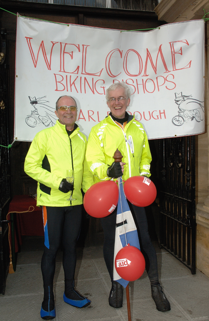 Bishop of Swindon, Dr Lee Rayfield (left) and the Bishop of Ramsbury, Dr Edward Condry take well-earned refreshment at the halfway stage of their marathon ride around Wiltshire