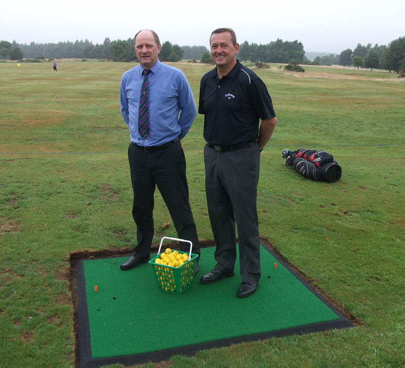 Les Trute and Simon Amor on one of the practice tee mats