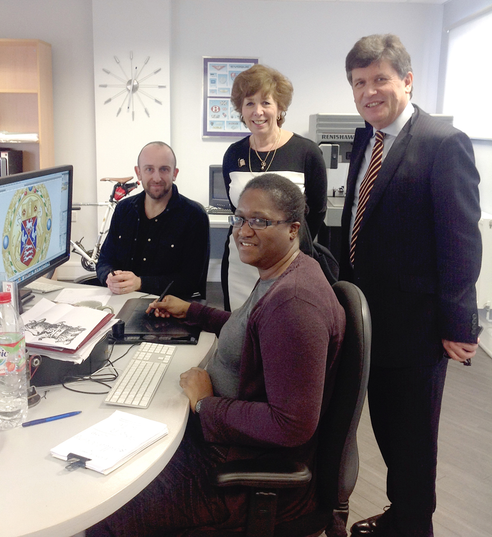 Mayor Councillor Guy Loosmore and Deputy Mayor Councillor Marian Hannaford-Dobson with Fattorini's graphic designers