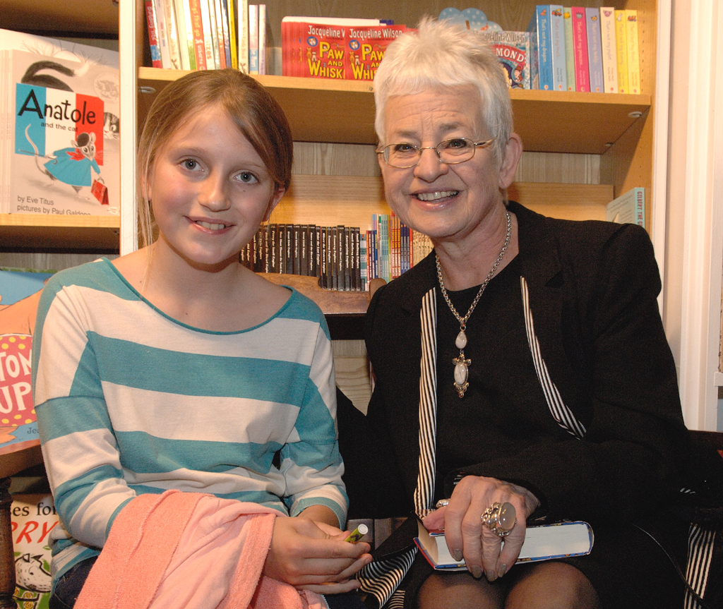 Dame Jaqueline signs a copy for Fianna Fernandes