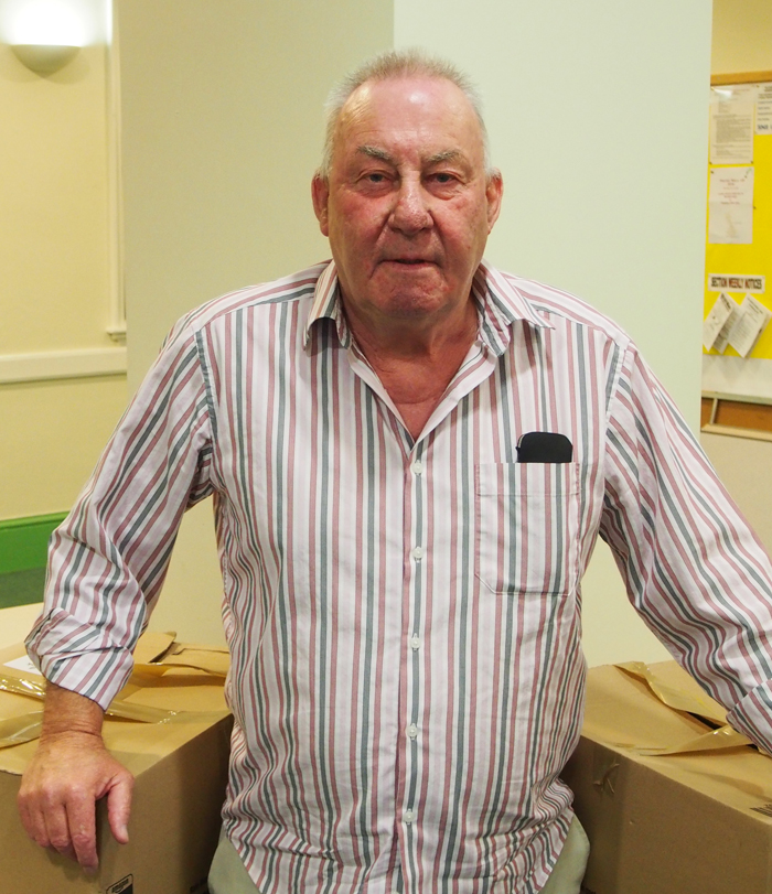 Alan Beamish with emergency food boxes