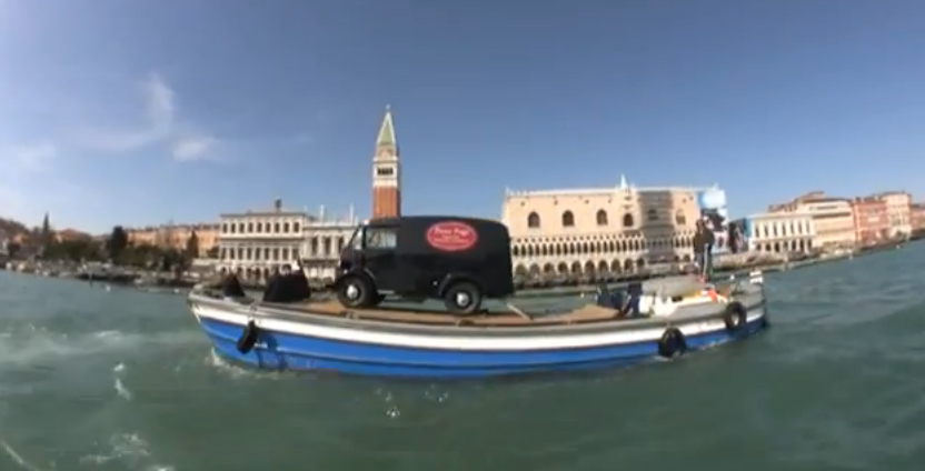 The van takes to the Grand Canal, Venice