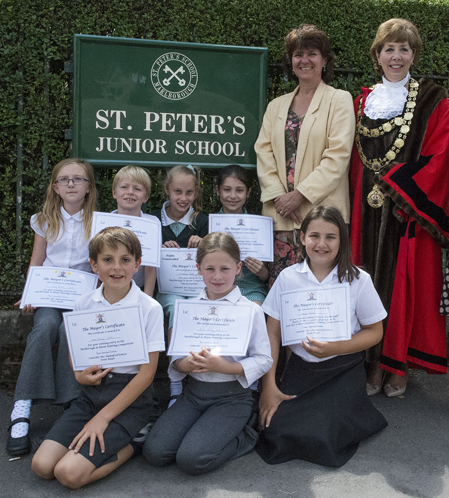 Winning pupils proudly displaying their winners certificates, accompanied by Headteacher Caroline Spindlow and Mayor Councillor Marian Hannaford-Dobson