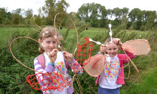 Rosie and Lucy with their Stonebridge bugs
