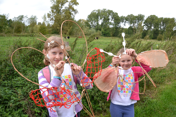 Rosie and Lucy with their Stonebridge bugs