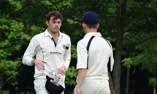 Penners (Penfold) being congratulated on his century