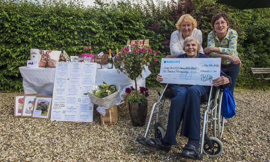 Organisers Alison Goulding (left) and Carolyn Stimpson present Pat Putland of the Kennet Valley RDA Carriage Driving Group with a cheque for £2,000
