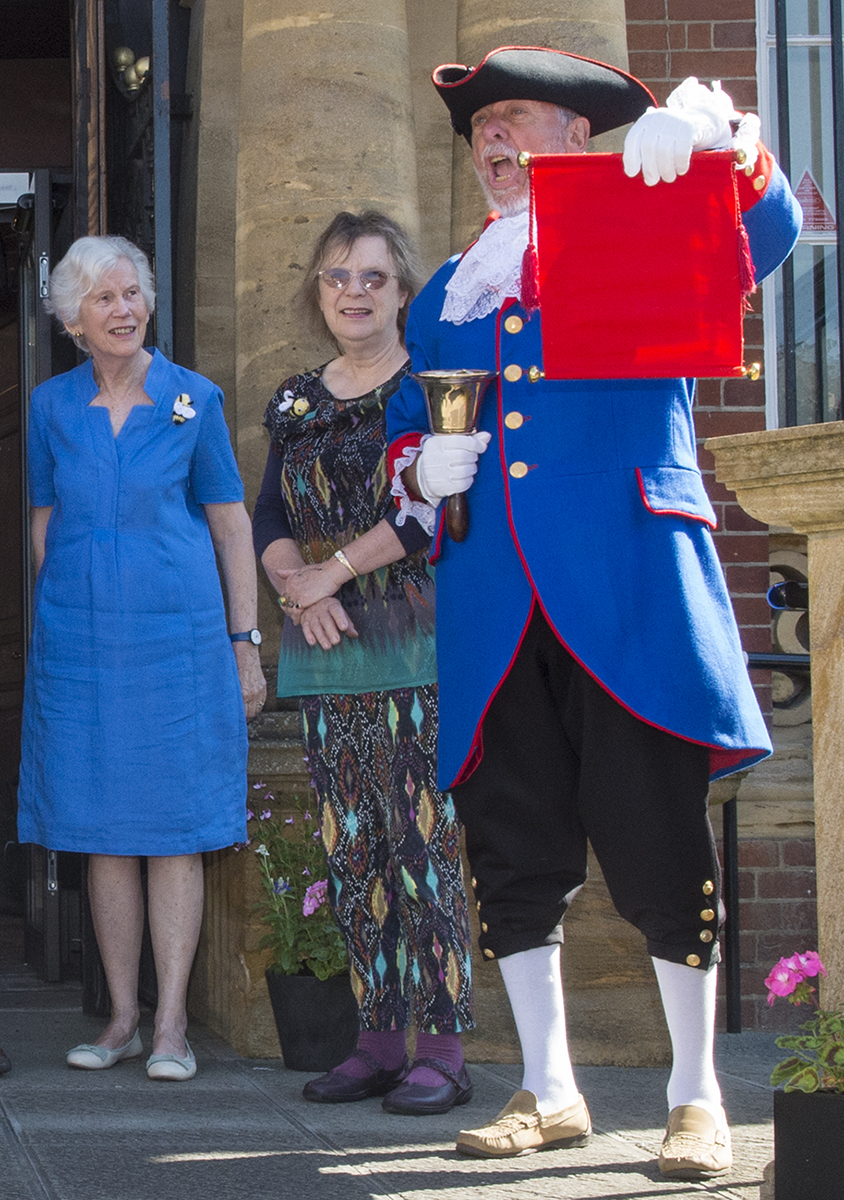Town Cryer Mike Tupman MBE showing a clean pair of tonsils with his 'shout' to announce the arrival of the judges