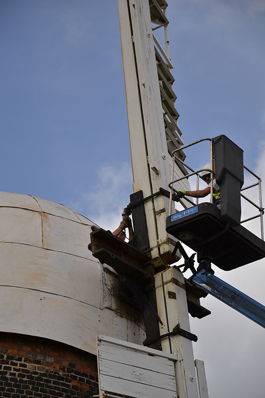 Going – an angle grinder is used to remove the rusty bolts