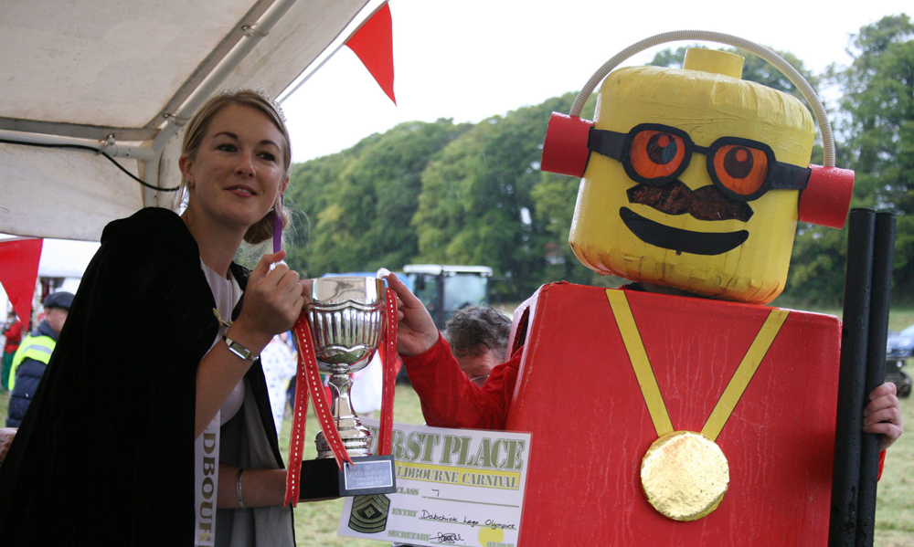 Queen Carla with a prizewinnng piece of Lego