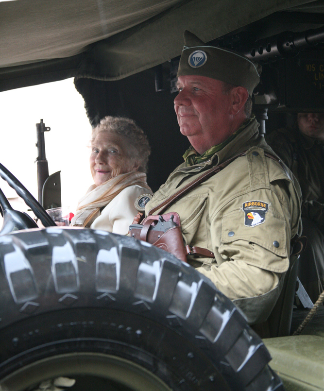 Carnival President Audrey Gilligan keeps dry with the 101st
