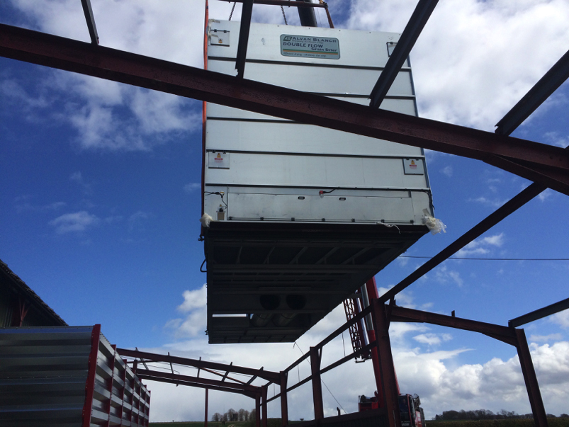 The drier being lowered into the barn easier this year