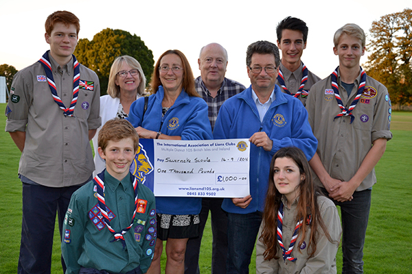 Savernake Explorer Scouts with a previous grant for their Tanzania project - from Marlborough & District Lions Club