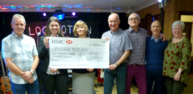 Social committee members Pete Styles, Lynne Bevan, Chris Simmons, Nick Patterson, Mervyn Cripps and Sandie Ward with Brighter Futures representative Jane Leighto