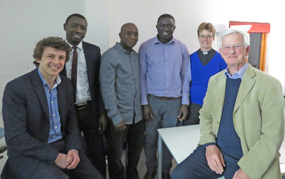 Newly re-elected MBG trustees Alex Davies (left) & Janneke Blokland with (rt) Dr Nick Maurice and three Gambian supporters of MBG (l to r) Kalifa Saho, Buba Barrow & Bakary Touray.