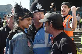 Saffiyah Khan smiles at the EDL leader