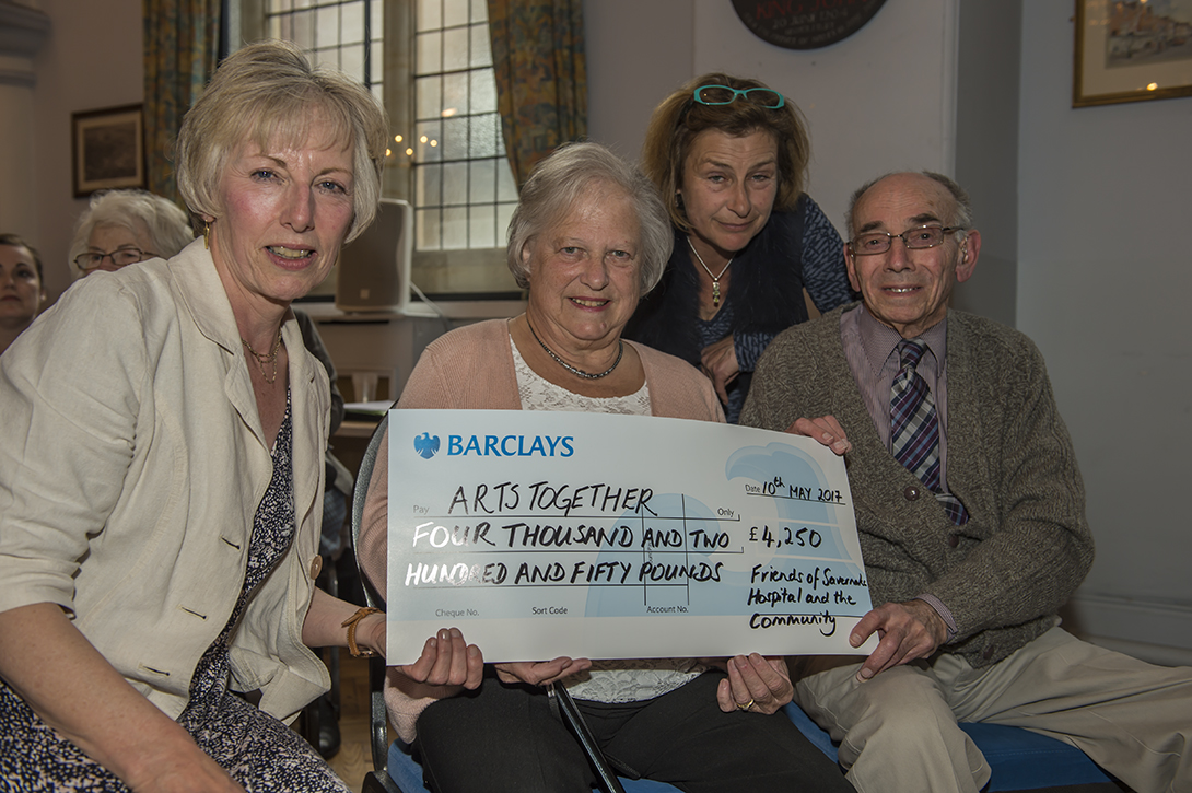 Jean and Alan Mayston, along with Julia McNeill from Arts Together receive the grant awards cheque from Pat Harper of Friends of Savernake