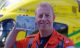 Wiltshire Air Ambulance Paramedic Keith Mills with the 'Christmas in Marlborough' card