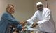 Caro Strover hands Thriving Through Venture's plans to Gambian President Adama Barrow