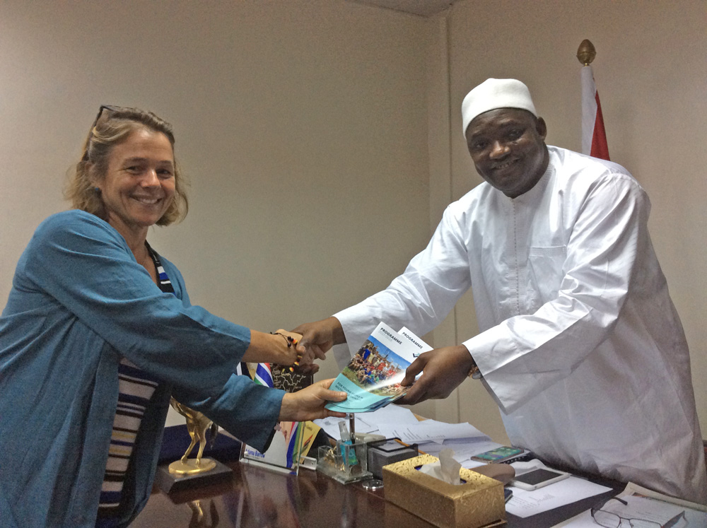 Caro Strover hands Thriving Through Venture's plans to Gambian President Adama Barrow