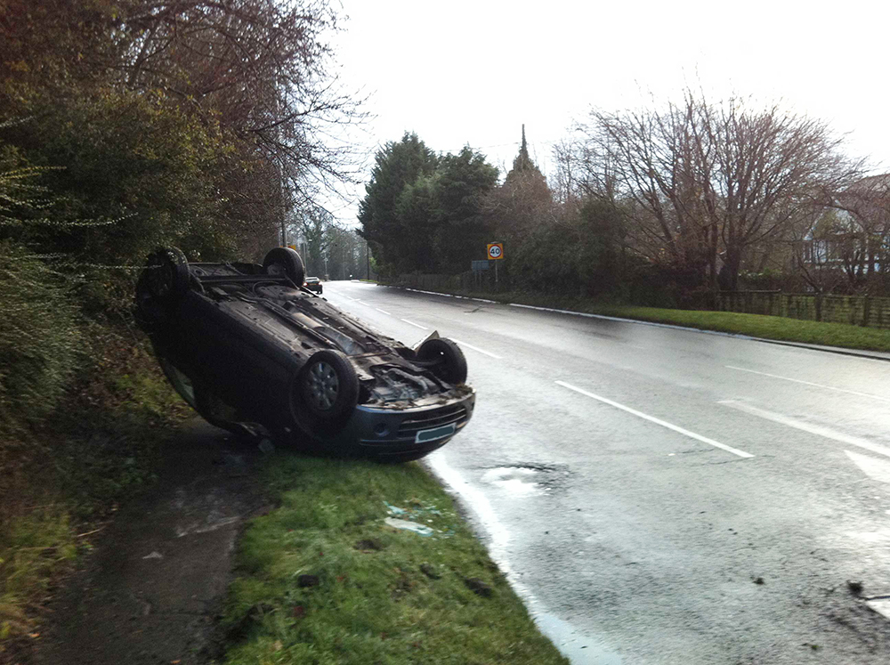 Car on its roof following a recent incident on the A4, between Downs Lane and the Manton turning  (pic - Peter Morgan)