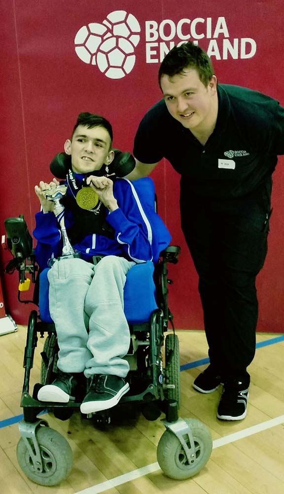 Shane Hartop with the Gold Medal and Trophy that he'd just won at the International Guildford Boccia tournament