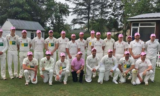 In the pink: the Saturday teams...and umpire
