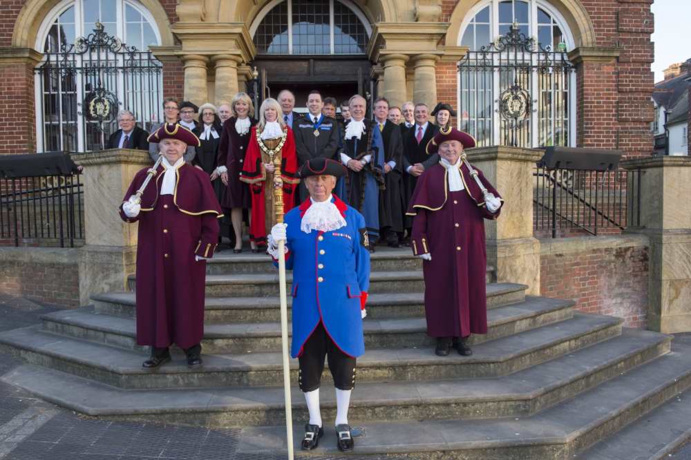 The whole Town Council with the High Sheriff of Wiltshire, Mrs Nicky Alberry on the steps of the Town Hall