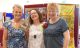 Left to right: Ros Lomas Ann Smith Clare Russell in front of Ros and Ann's textile art