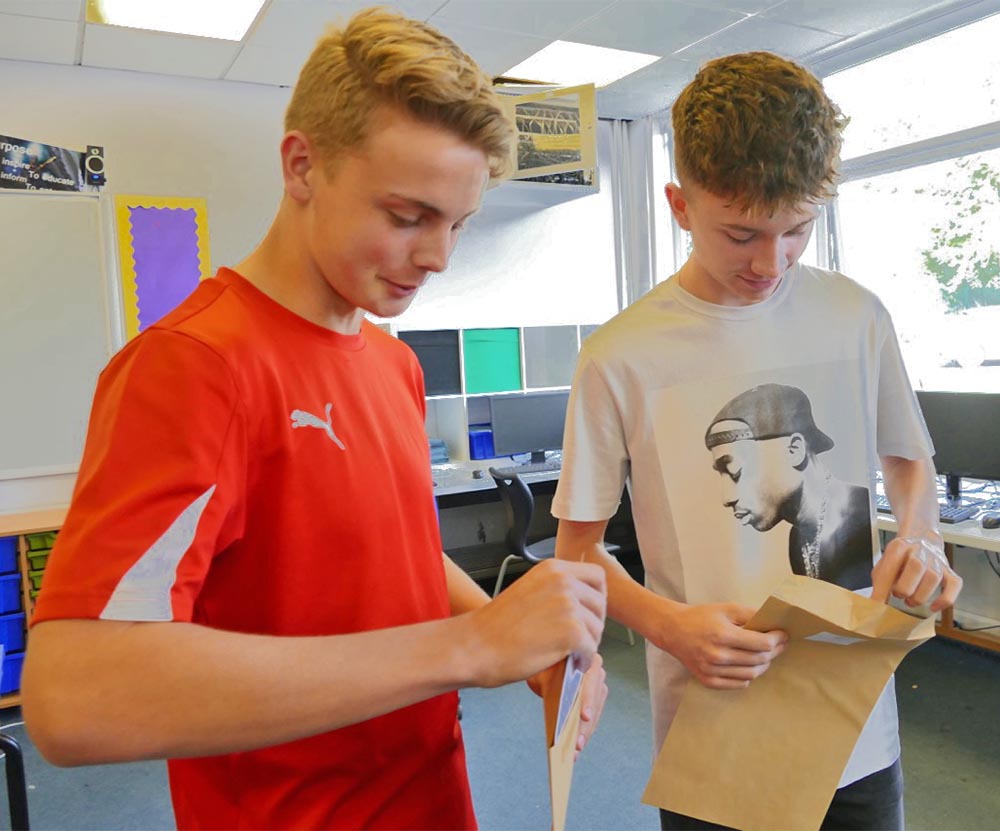 Pewsey Headboy Ollie England opening his GCSE results with friend Will Garrett