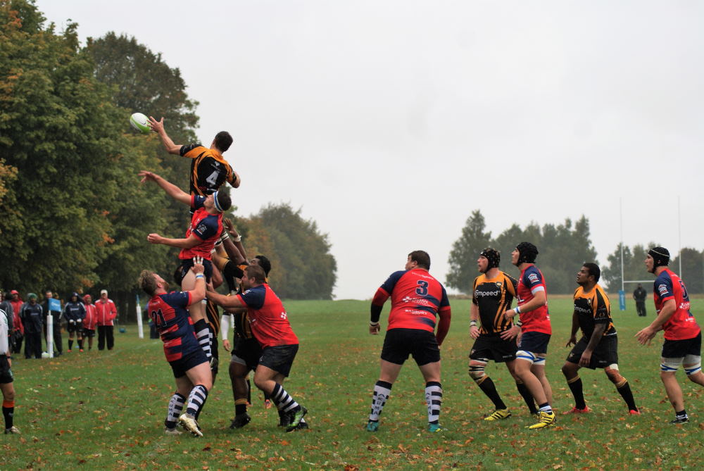 Captain Jamie Pittams leaps high to secure line-out ball
