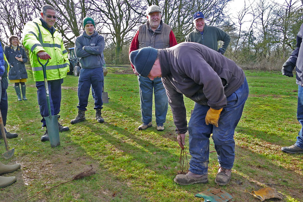 Rob Greaves Head Greenkeeper demonstrates how to plant a tree