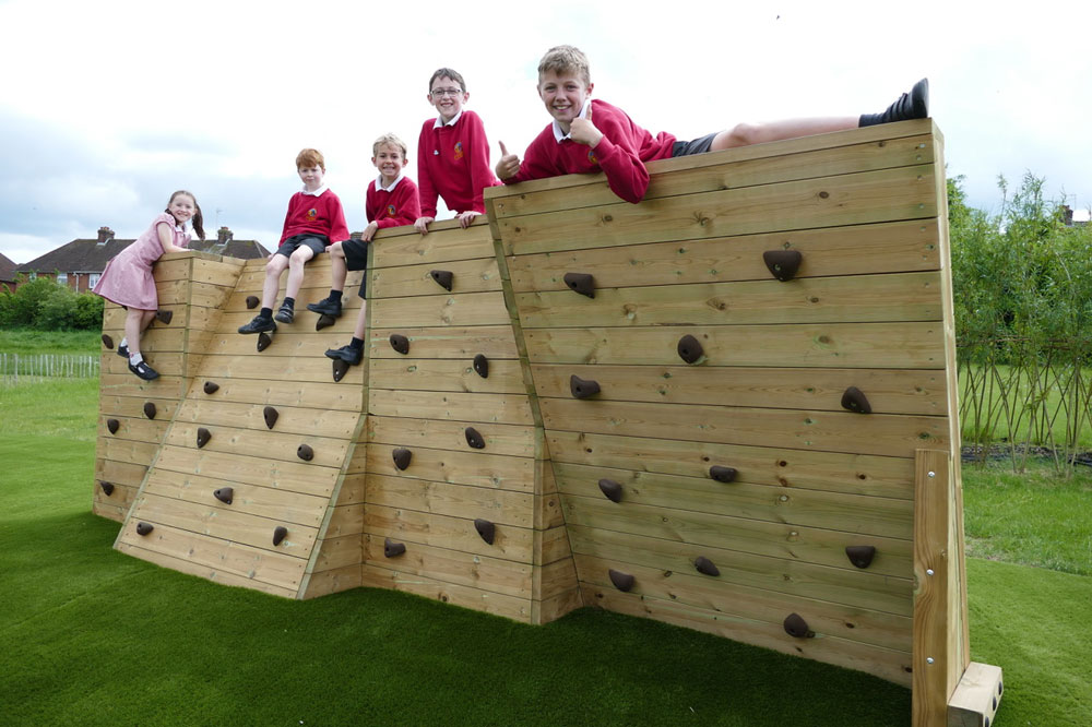The bouldering wall - new playground equipment Marlborough St Mary's