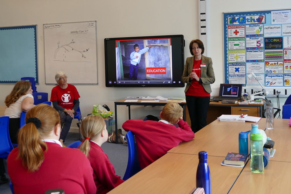 Fidelma Meehan and Jennifer Brisker from Save the Children speaking to Year 6 pupils at Marlborough St Marys