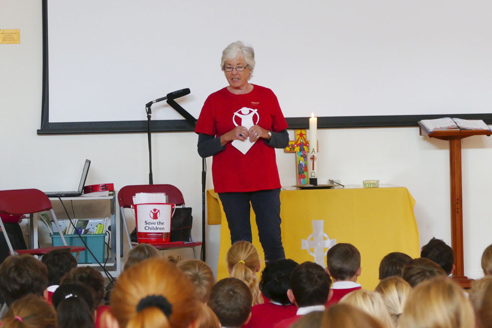Jennifer Brisker from Save the Children speaking at Marlborough St Mary's Assembly