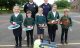 Lee Jeffery PE leader at Pewsey Primary, Karl Edwards - Manager of Crosby and Lawrence with Pewsey pupils and some of the new tennis equipment