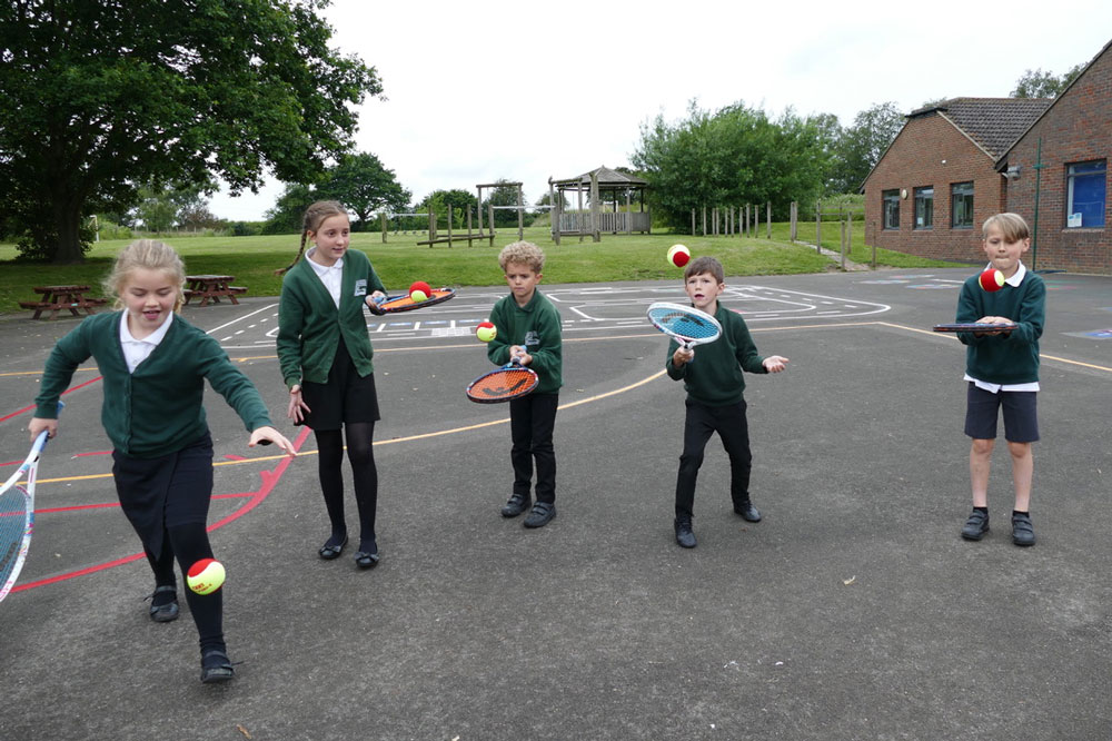 Pewsey pupils try out the new tennis equipment