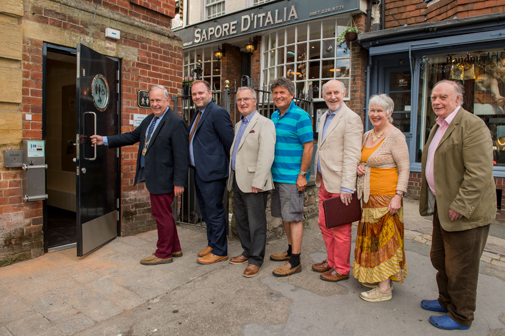 Councillors (and former Mayor, Edwina Fogg) queue up outside the new Town Hall Toilet