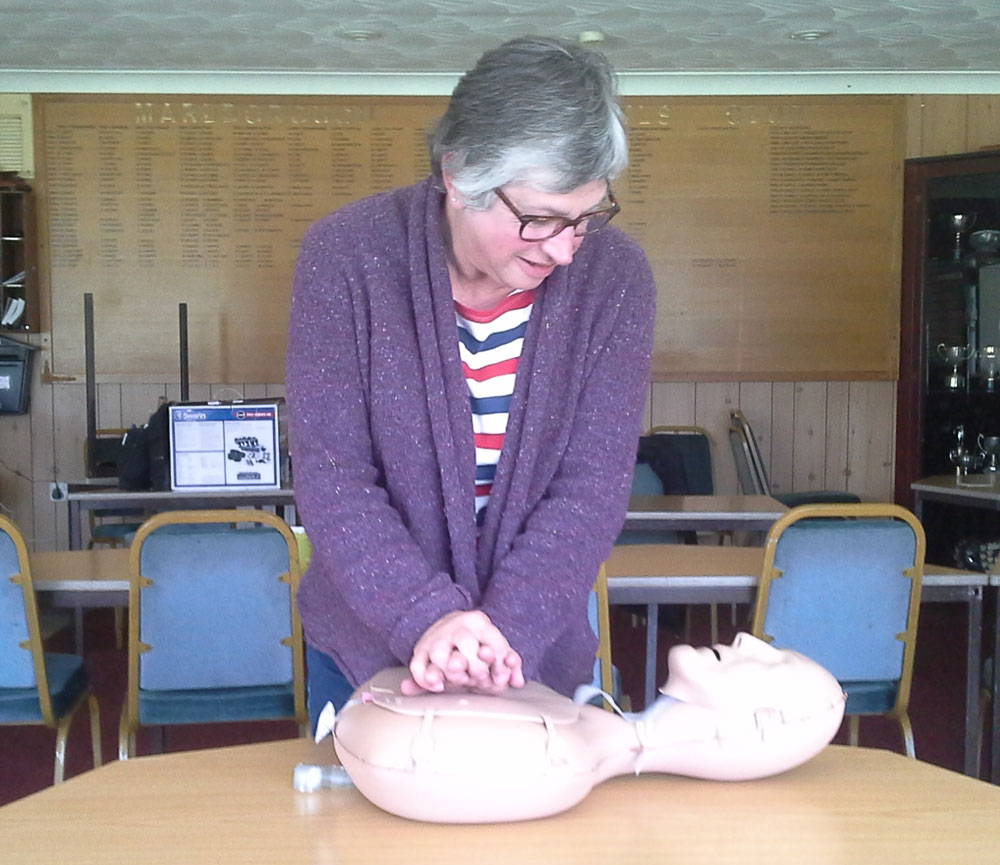 Defibrillator training at the recent awareness coffee morning at the Bowls Club