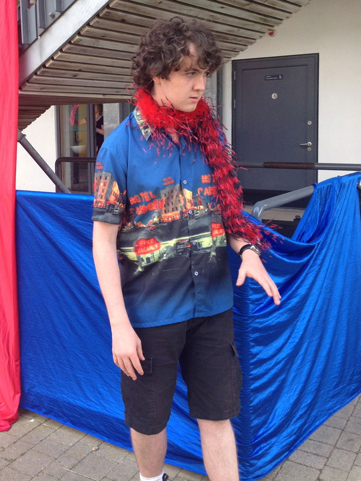 Mercutio preparing for his role in the promenade performance